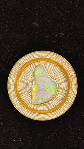Brooch in gold with seed pearl and large opal by michael zobel