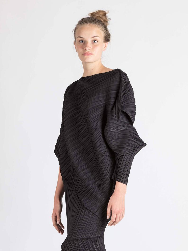 Long sleeved permanently pleated dress by caren shen